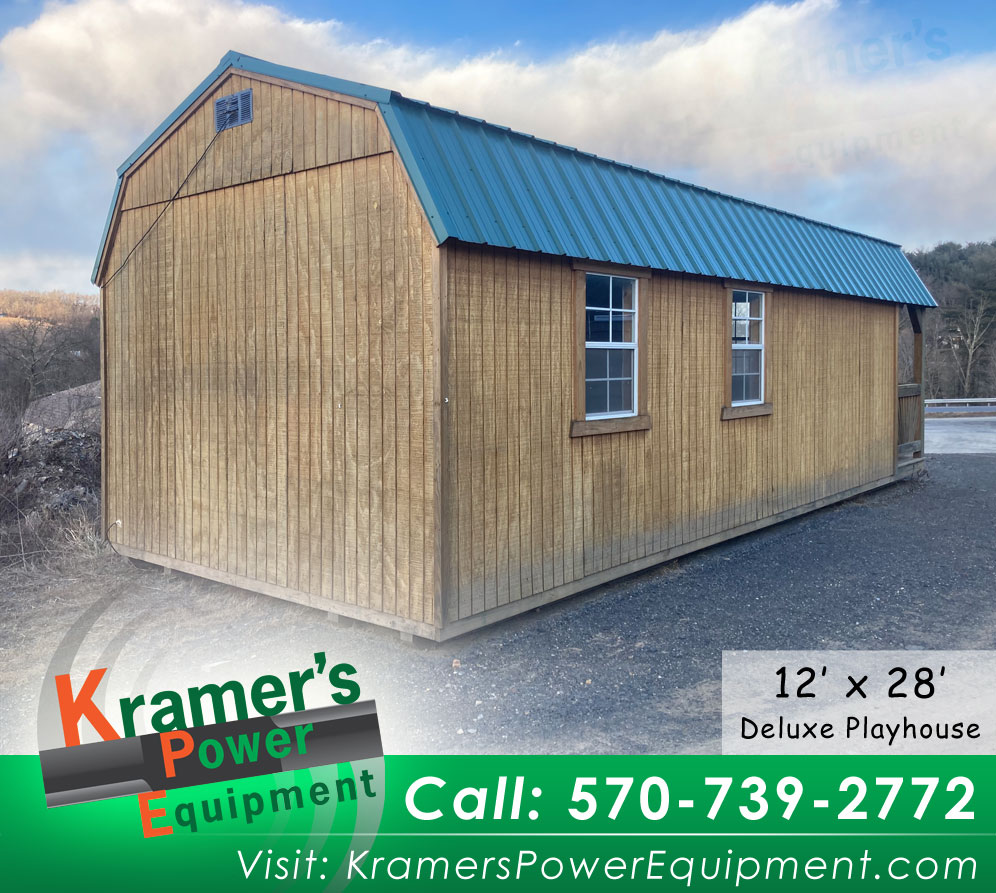 Back of Repo Lofted Barn Deluxe Playhouse (12'x28')