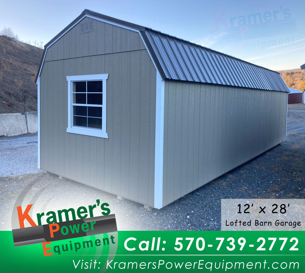 Back of Shed With Roll Up Garage Door (12'x28')